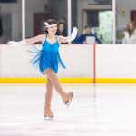 A skater performs at the Juneau Skating Club's 11th Annual Basic Skills competition on Sunday.