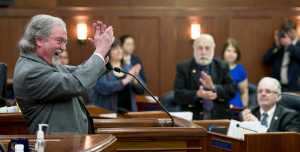 Craig Stowers, Chief Justice of the Alaska Supreme Court, reacts to introducing his wife, Monique, during his State of the Judiciary speech to a Joint Session of the Alaska Legislature at the Capitol on Wednesday.