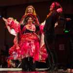 Joanne Sam models her "Phoenix" made at The Canvas with help from Cristina Carpentier, Larissa Manewell, Gary Peterson, Andrea Short and Phoebe Rohrbacher at the Wearable Art Extravaganza 2016 at Centennial Hall on Sunday, Feb. 14, 2016.