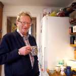 Larry Sanders at home in his kitchen in Oxford, England on Monday.