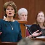 Sen. Lisa Murkowski speaks to a joint session of the Alaska Legislature during her annual visit to the Capitol on Wednesday. In the background are Crystaline Jones, Chief Clerk for the House of Representatives, center, and Liz Clark, Secretary of the Senate.