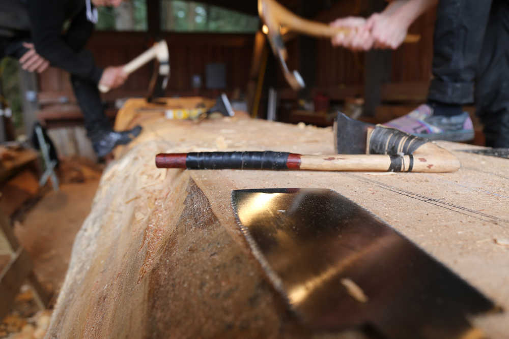 The carvers and their tools. (National Park Service | Erin Fulton)
