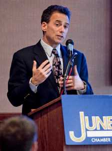 Juneau District Court Judge Keith Levy speaks to the Juneau Chamber of Commerce about recidivism rates in Alaska's judicial system at the Hanger Ballroom on Thursday. Attorney Ben Brown and Sen. John Coghill, R-Fairbanks, also spoke during the Chamber's weekly luncheon.