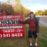 Logan Miller and Nick Rutecki grew up in Juneau. After graduating college, they decided to start walking around the country, "with backpacks and no plans." Here, Miller poses next to the very first sign they saw, in the first mile of the trip.