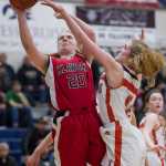 Klawock's Ashley Huffine, left, shoots against Yakutat's Sarah Newlun during the 1A Region V Basketball Championship game at Thunder Mountain High School on Friday. Klawock won 37-35.