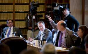 Rep. Les Gara, D-Anchorage, speaks during Tuesday's House Finance Committee meeting on the state operating bill at the Capitol on Tuesday. Listening to Rep. Gara are Rep. Scott Kawasaki, D-Fairbanks, left, Rep. Lance Pruitt, R-Anchorage, and Rep. Tammie Wilson, R-North Pole.