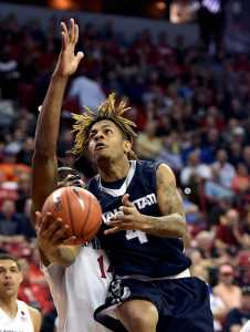 Utah State's Shane Rector shoots against San Diego State during the second half of an NCAA Mountain West Conference men's tournament game on Thursday in Las Vegas. San Diego State won 71-65.