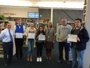 Pictured from left to right are Ted VanBronkhorst, Honesty Zahnd, Rikki Price, Daniela Fernandez, Kathy McCasland, Dan Larson and Cameron Waisingham