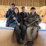 From left, carvers James (Gooch Éesh) Hart, Zack (Tlél Tooch Tláa.aa) James, Wayne Price, and Steven Price are carving two 40-foot canoes out of spruce for the Huna Tlingit to paddle into Glacier Bay for their ceremonial return, and the dedication of the Xúna Shuká Hit tribal house, on August 25 of this year. Photos by Mary Catharine Martin | Capital City Weekly