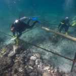 In this undated photo made available by Blue Water Recoveries company on Tuesday, March 15, 2016, divers excavate the wreck site of the Portuguese explorer Vasco da Gama's ship, Esmeralda which sank in a storm in May 1503 off the coast of Al Hallaniyah island in Oman's Dhofar region. (Blue Water Recoveries company via AP)