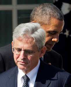 Federal appeals court judge Merrick Garland, stands with President Barack Obama as he is introduced as Obama's nominee for the Supreme Court during an announcement in the Rose Garden of the White House, in Washington, Wednesday, March 16, 2016.  Garland, 63, is the chief judge for the United States Court of Appeals for the District of Columbia Circuit, a court whose influence over federal policy and national security matters has made it a proving ground for potential Supreme Court justices. (AP Photo/Pablo Martinez Monsivais)
