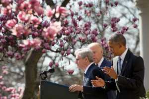 Federal appeals court judge Merrick Garland, left, accompanied by President Barack Obama and Vice President Joe Biden, steps to the microphone as he is introduced as Obama's nominee for the Supreme Court in the Rose Garden of the White House on Wednesday.