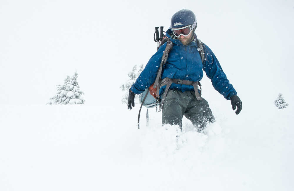 Rob Cadmus snowboards through knee-deep snow at the top of the Eaglecrest Ski Area on Wednesday.