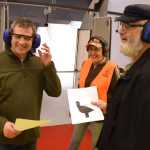 Rep. Chris Tuck, D-Anchorage, at left, compares scores with Rep. Paul Seaton, R-Homer, during the pistol challenge portion of the 2016 Legislative Shoot, hosted by the Alaska Correctional Officers Association on Saturday at the Juneau Gun Club, Juneau Archery Club and the hunter training center on Montana Creek Road.