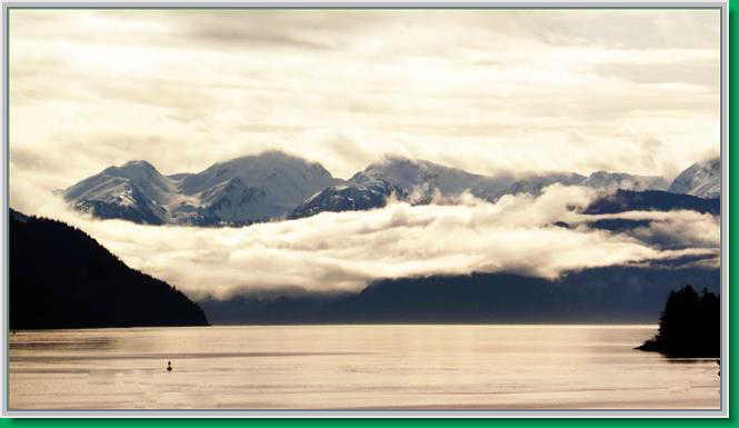 Like soft cotton batting, fog nestles on and over the Coast Mts.