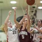Haines' Sarah Elliot, center, goes for a rebound between Hoonah's Mariah Martin, left, and Melissa Fisher during their Womens bracket game in the 2016 Juneau Lions Club 70th Gold Medal Basketball Tournament at Juneau-Douglas High School on Tuesday.