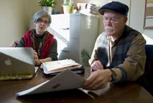 June Hall and Paul Disdier talk on Feb. 18 at their attorney's office about their plans to permit and build one of the first legal marijuana grow sites in Juneau at their North Douglas property.