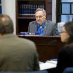 House Education Committee members Rep. Wes Keller, R-Wasilla, left, Rep David Talerico, R-Healy, center, and Rep. Harriet Drummond, D-Anchorage, listen to Sen. Mike Dunleavy, R-Wasilla, and his staff member, Christa McDonald, speak about Sen. Dunleavy's bill, SB 89, at the Capitol on Wednesday.