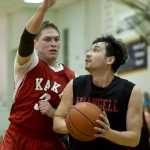 Wrangell's Cody Angerman, right, looks to the basket against Kake's Tim Demmert during their B bracket game in the 2016 Juneau Lions Club 70th Gold Medal Basketball Tournament at Juneau-Douglas High School on Wednesday.