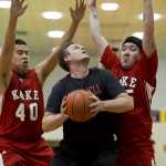 Wrangell's Graham Gablehouse, center, looks for the basket against Kake's Shawn Jackson, left, and Dion Jackson during their B bracket game in the 2016 Juneau Lions Club 70th Gold Medal Basketball Tournament at Juneau-Douglas High School on Wednesday.