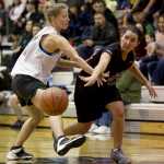 Craig's Vanessa James passes around Haines' Christine Hansen during their Womens bracket game in the 2016 Juneau Lions Club 70th Gold Medal Basketball Tournament at Juneau-Douglas High School on Thursday. Craig won 59-45.