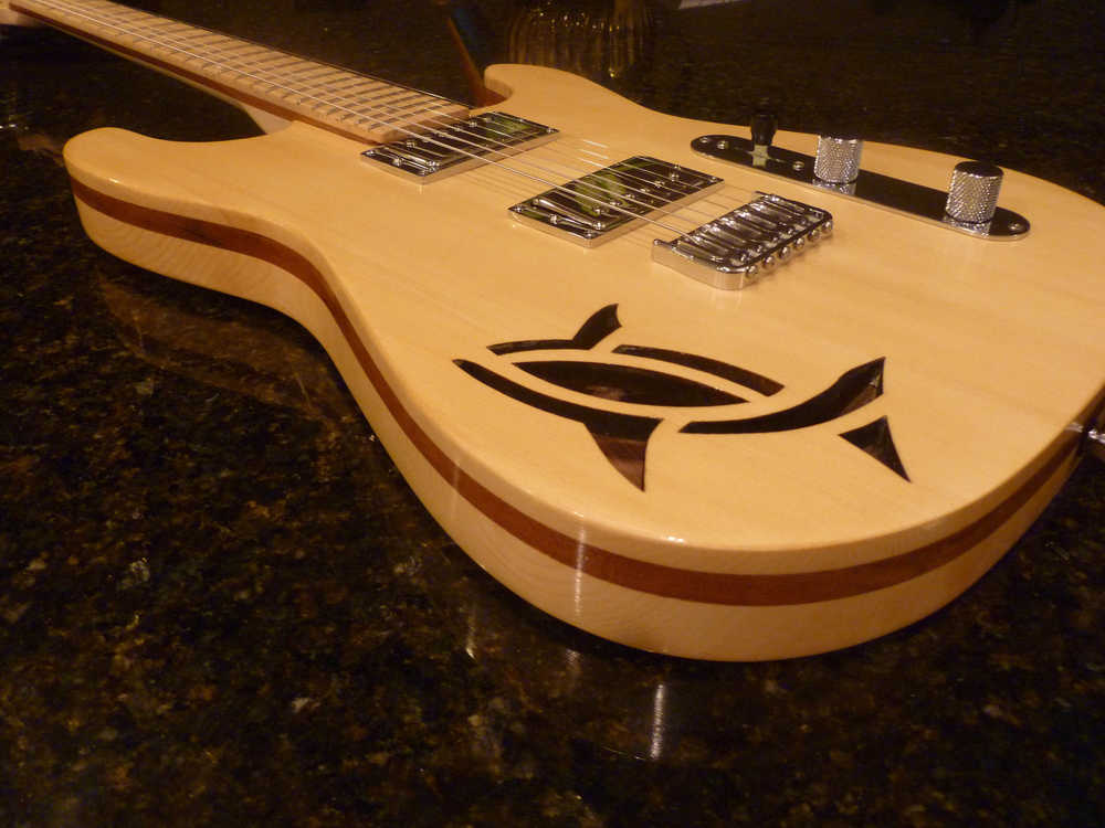 A custom guitar handmade by George Gress whose work will be on display all month at The Canvas.