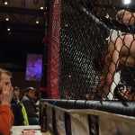 A scoring judge watches Nathan Hall as he gets into a position that helps him win against Randy Willard at Friday night's beatdown. The event was held at Centennial Hall. Nathan Hall won the match.