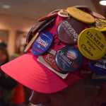Dennis Harris shows off part of his collection of political memorabilia before the Juneau Democratic Caucus on Saturday, March 26, 2016 in Centennial Hall's Sheffield Ballroom.