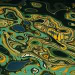 Shops reflect on the water in Juneau in 2012. Photo by Sky Pedersen.