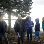 Alan Boraas, a profossor of Anthropology at Kenai Peninsula College, orients a group of Kenaitze Indian Tribe members, students and other college faculty at Kalifornsky Village on March 24.