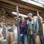 Brent and Annette Cole stand inside their original shop. Since May of 2015, the couple have begun production in their new facility, where drying, processing and storage can happen under one roof. Photo Bethany Goodrich, 2014.