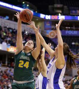 Alaska Anchorage's Sierra Afoa (24) shoots against Lubbock Christian's Kellyn Schneider during the second half of the championship game at the women's NCAA Division II basketball tournament Monday, April 4, 2016, in Indianapolis. (AP Photo/Michael Conroy)