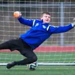 Senior goalie John Seymour dives for a ball during Thunder Mountain High School boys soccer team practice Wednesday at TMHS.