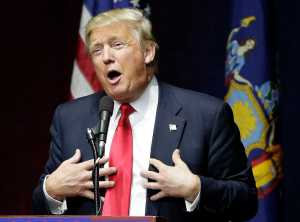 Republican presidential candidate Donald Trump speaks during a campaign rally, Wednesday, April 6, 2016, in Bethpage, N.Y. A devastating indictment of Donald Trump emerges from new AP-GfK poll. Americans overwhelmingly view him unfavorably.In every part of the country. Men and women, black, white, Hispanic.  (AP Photo/Julie Jacobson)