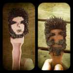 Two people created on magnet wands from the tonalite and magnetite black sand from Eagle Beach, which is highly magnetic. Photo by Amy Pinney.