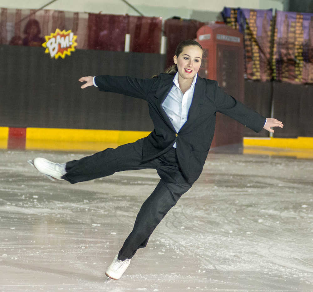 Katie McKenna starts her performance as mild-mannered reporter Clark Kent during the Juneau Skating Club's "Heroes and Villains" show at Treadwell Arena on Saturday.