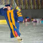 Emcee Pam Leary closes out the first act during the Juneau Skating Club's "Heroes and Villains" show at Treadwell Arena on Saturday.