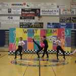 Karin Rathbone, Seora Chon, 1st Lieutenant Jayce Wendling, Brady Allio, Catriona Pearson and Michaela Crabtree performing the Pink Ladies section of the Thunder Mountain team's Tournament routine.