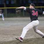 Juneau-Douglas High School's Erik Kelly pitches  during their 7 p.m. Monday  game against Petersburg at Adair Kennedy Park. Juneau won 14-4.