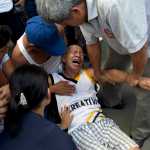 Ruben Mero is assisted by a relatives and paramedics after he was overcome with grief during the funeral of his niece Kexly Valentino who died in the earthquake, in Montecristi, Ecuador, Tuesday, April 19, 2016. The strongest earthquake to hit Ecuador in decades flattened buildings and buckled highways along its Pacific coast, sending the Andean nation into a state of emergency. (AP Photo/Rodrigo Abd)