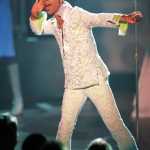 FILE - In this April 10, 1997 file photo, Prince performs a medley of "Take Me With U" and "Rasberry Beret" at the 4th annual VH1 Honors in Universal City, Calif. Prince's publicist has confirmed that Prince died at his home in Minnesota, Thursday, April 21, 2016. He was 57. (AP Photo/Mark J. Terrill, File)