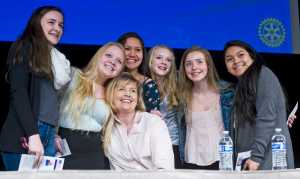 Pillars of America speaker Tiana Tozer poses for a picture with eighth grade students from Floyd Dryden Middle School at Centennial Hall on Wednesday.