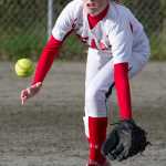 Juneau-Douglas' centerfielder Amanda Bicknell runs down a flyball against Ketchikan at Melvin Park on Friday.