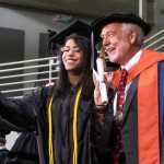 University of  Alaska Southeast Chancellor Richard A. Caulfield poses for a selfie with a recent graduate during the 2016 UAS commencement ceremony held Sunday.