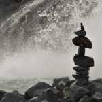 A precisely balanced rock cairn at Nugget Falls, with all credit to the builders. Photo by Brooke Daly.