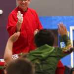 Chef Dr. Robert P. Dell'Amore asks kids a question during a healthy eating and cooking presentation at the Boys and Girls Club in Fairbanks on April 29. Dell'Amore is a chef and healthful foods advocate who spends much of his time traveling the country spreading the gospel of good food.