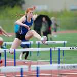 Thunder Mountain's Naomi Welling leads in the 100-meter hurdles during the track meet Saturday morning at Thunder Mountain.