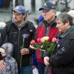 Ian Fisk, left, Gov. Bill Walker, center, and Rep. Sam Kito III attend the Blessing of the Fleet and Dedication of Names at the Alaska Commercial Fishermen's Memorial in Juneau on Saturday, May 7, 2016.