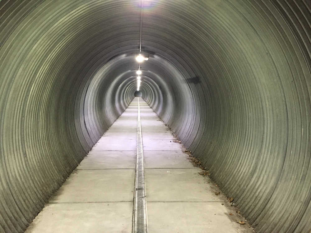 An underground walkway, or an optical illusion, or the inside of a tin can? Photo by Kathleen Samalon.