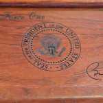 This photo taken May 6 in Anchorage shows a wooden case holding two decks of playing cards and bearing the presidential seal that was presented to Gov. Bill Walker by President Barack Obama when the two flew on Air Force One in August 2015 from Washington, D.C., to Anchorage.